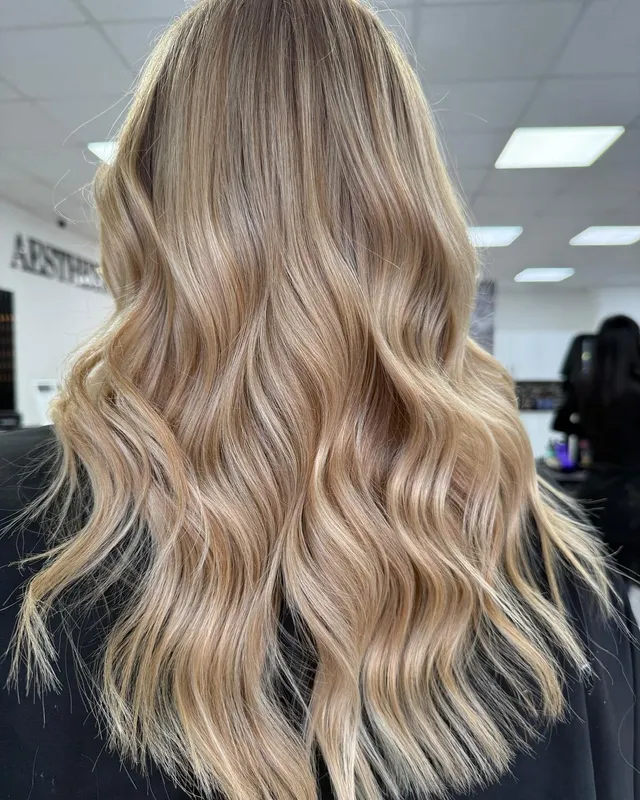 A bright blonde bombshell finish by Emma