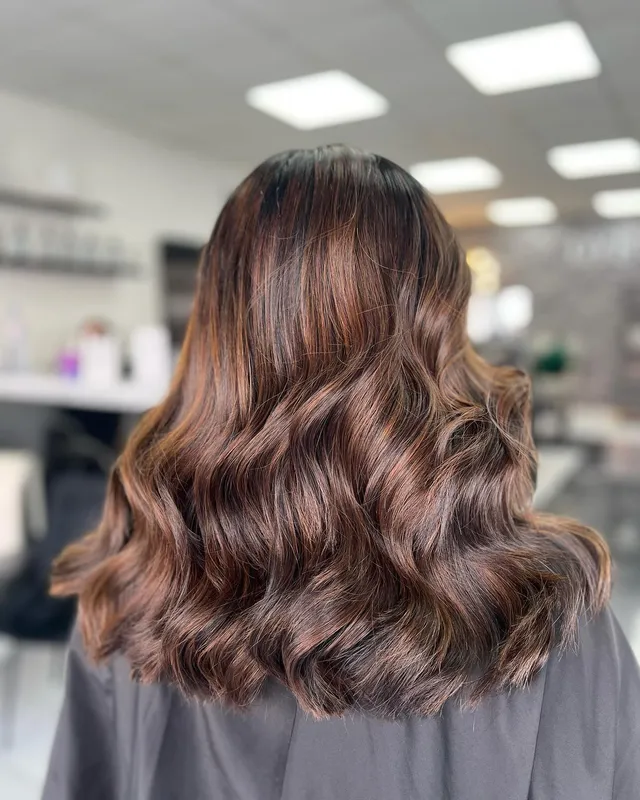 A rich brunette hair transformation by Holly
