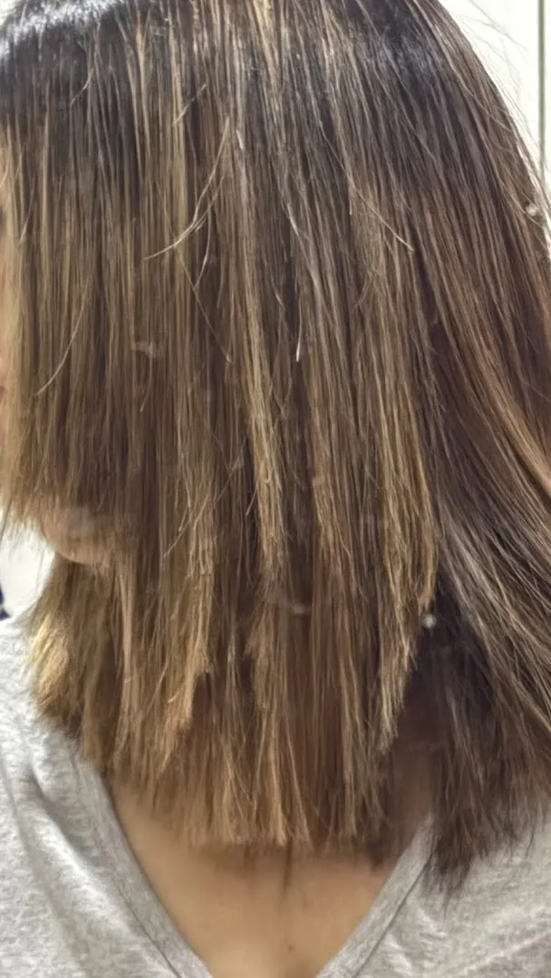A soft balayage blend, mid-lengths to ends