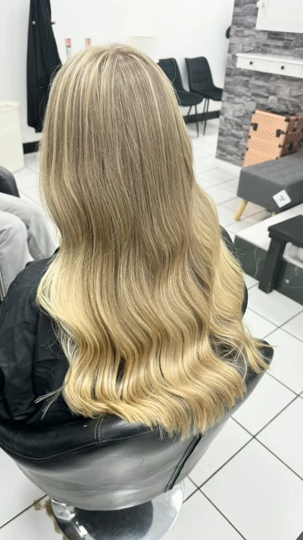 Long blonde waves finished in salon